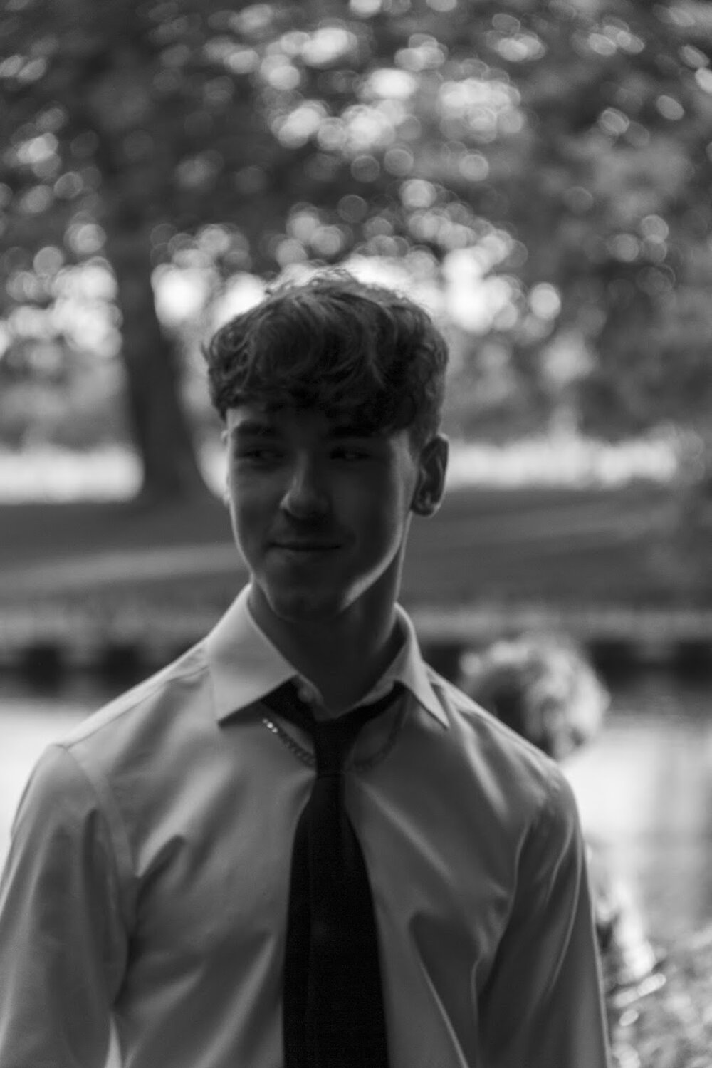 Jason Harding in shirt and tie, black and white portrait